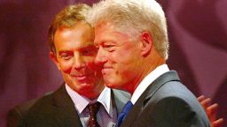 BLACKPOOL, UNITED KINGDOM - OCTOBER 2:  British Prime Minister Tony Blair (L) pats former U.S. President Bill Clinton after his address during the Labour Party's annual conference October 2, 2002 in Blackpool, United Kingdom. Clinton offered full support to Blair on Iraq but said force should be a last resort.  (Photo by Scott Barbour/Getty Images)