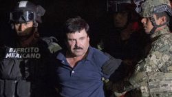 ALTERNATIVE CROP OF RLB111.- Mexican drug lord Joaquin "El Chapo" Guzman is escorted by army soldiers  to a waiting helicopter, at a federal hangar in Mexico City, Friday, Jan. 8, 2016. The world's most wanted drug lord was recaptured by Mexican marines Friday, six months after he fled through a tunnel from a maximum secuirty prison in a made-for-Hollywood escape that deeply embarrassed the government and strained ties with the United States. (AP Photo/Rebecca Blackwell)