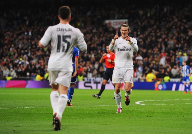 Gareth Bale (R) celebrates scoring Real's second goal of the night shortly after.