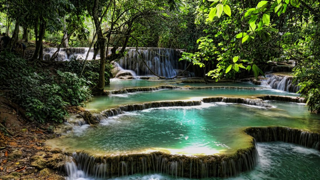 <strong>Luang Prabang, Laos: </strong>This ancient Laos capital truly does offer it all. Surrounded by mountains, the UNESCO-protected ancient capital of the Lan Xang Kingdom is surrounded by golden wats, rivers and stunning scenery such as the Kuang Si Falls, pictured. 