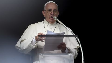 Pope Francis addresses the crowd in St. Peter's Square on Sunday at the Vatican.