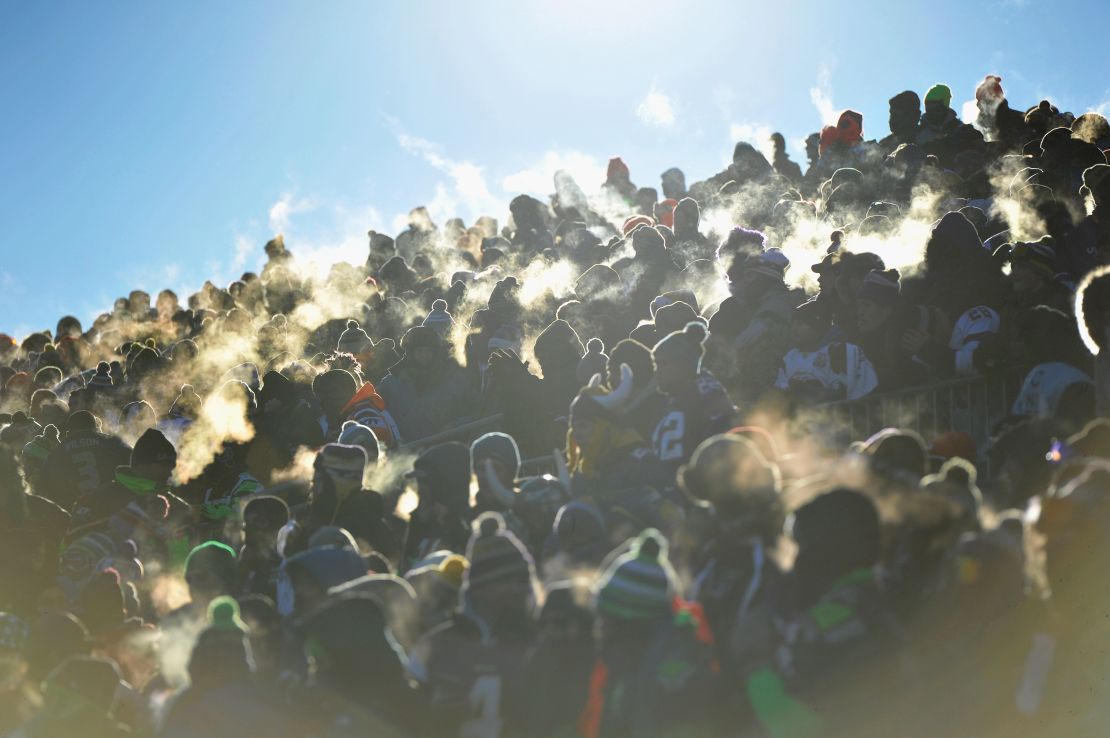 Body heat creates little clouds of steam off fans at TCF Bank Stadium in Minneapolis, Minnesota.