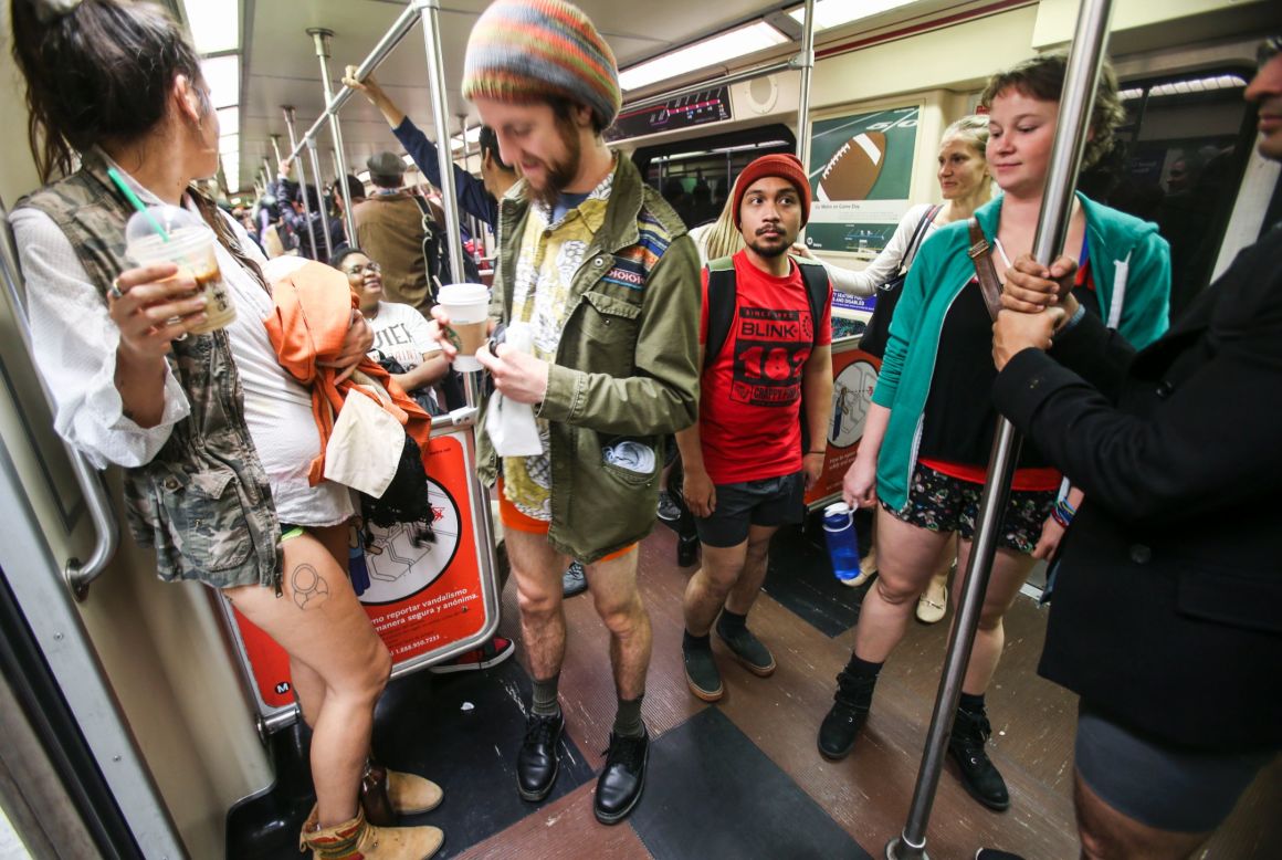 Los Angeles participants ride a Metro train.