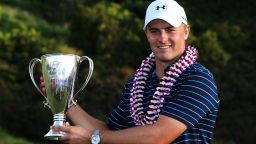 LAHAINA, HI - JANUARY 10:  Jordan Spieth celebrates with the trophy after winning the final round of the Hyundai Tournament of Champions at the Plantation Course at Kapalua Golf Club on January 10, 2016 in Lahaina, Hawaii.  (Photo by Sam Greenwood/Getty Images)
