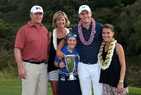 Spieth, pictured with his father Shawn, mom Chris, sister Ellie and girlfriend Annie Verret (far right) is the world No. 1 following his 2015 successes.