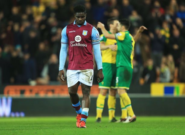 Aston Villa captain Micah Richards dejectedly leaves the field after his side's 2-0 defeat to Norwich City at Carrow Road. The Villans have won just one English Premier League match this season.