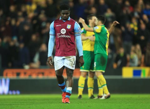 Aston Villa captain Micah Richards dejectedly leaves the field after his side's 2-0 defeat to Norwich City at Carrow Road. The Villans have won just one English Premier League match this season.