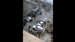 A photo taken by a local councilman shows cars belonging to aid agencies arriving in Madaya on Monday.