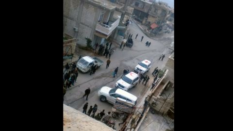 A photo taken by a local councilman shows cars belonging to aid agencies arriving in Madaya on Monday.