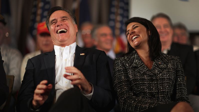 Former Massachusetts Gov. Mitt Romney and Haley laugh during a rally on January 13, 2012, on Hilton Head Island, South Carolina.