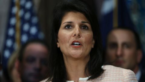 Haley tells the media that the Confederate war flag should be removed from the Capitol grounds in Colombia on June 22, 2015.