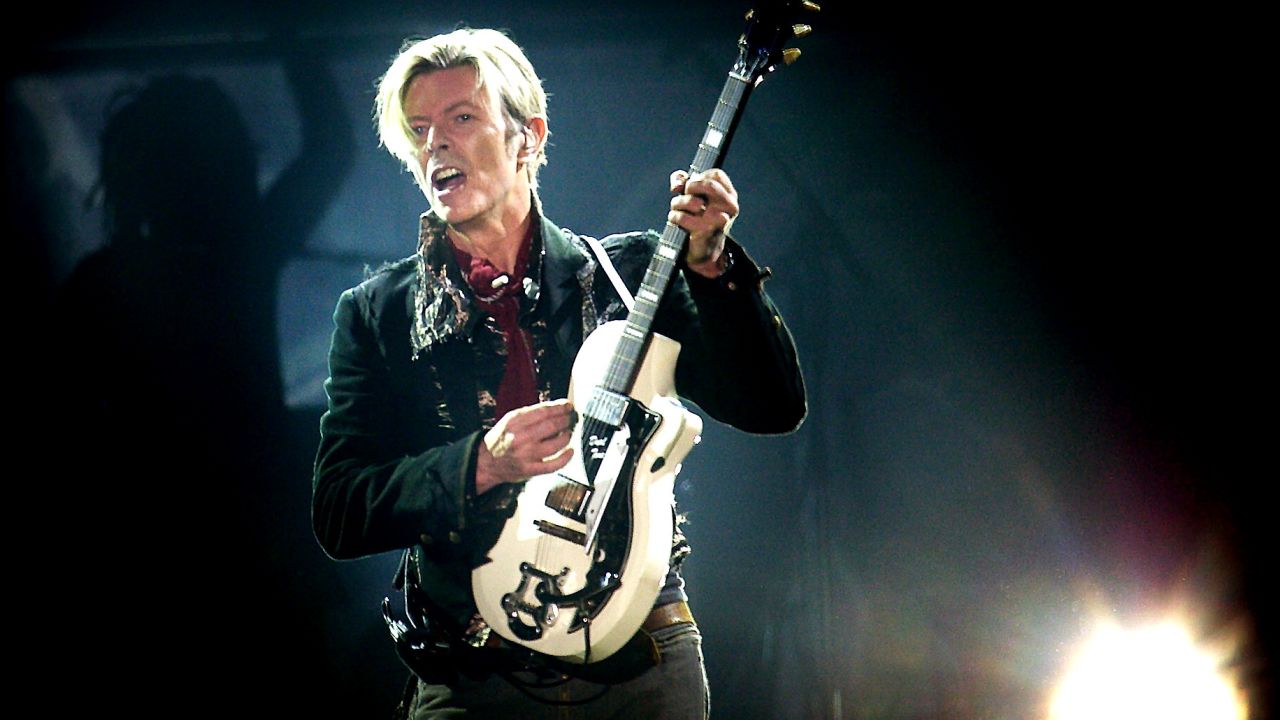 Rock legend David Bowie performs on stage at the Forum in Copenhagen late 07 October 2003. == DENMARK OUT == AFP PHOTO NILS MEILVANG/SCANPIX NORDFOTO (Photo credit should read NILS MEILVANG/AFP/Getty Images)