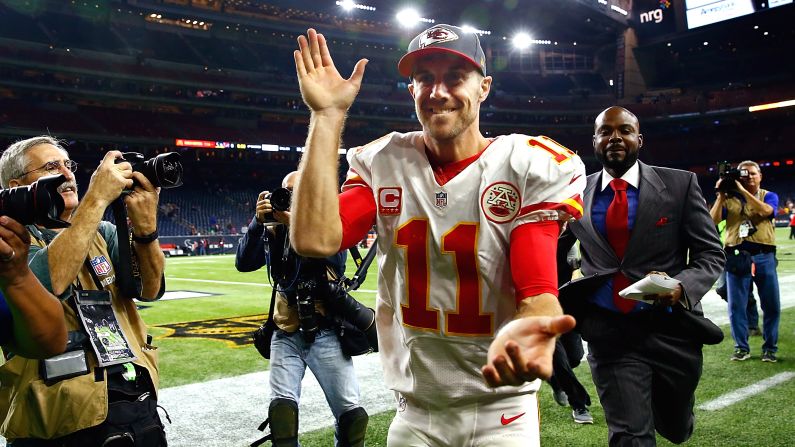 Kansas City quarterback Alex Smith walks off the field in Houston after his Chiefs blew out the Texans 30-0 on Saturday, January 9. It was Kansas City's first playoff win since 1994.