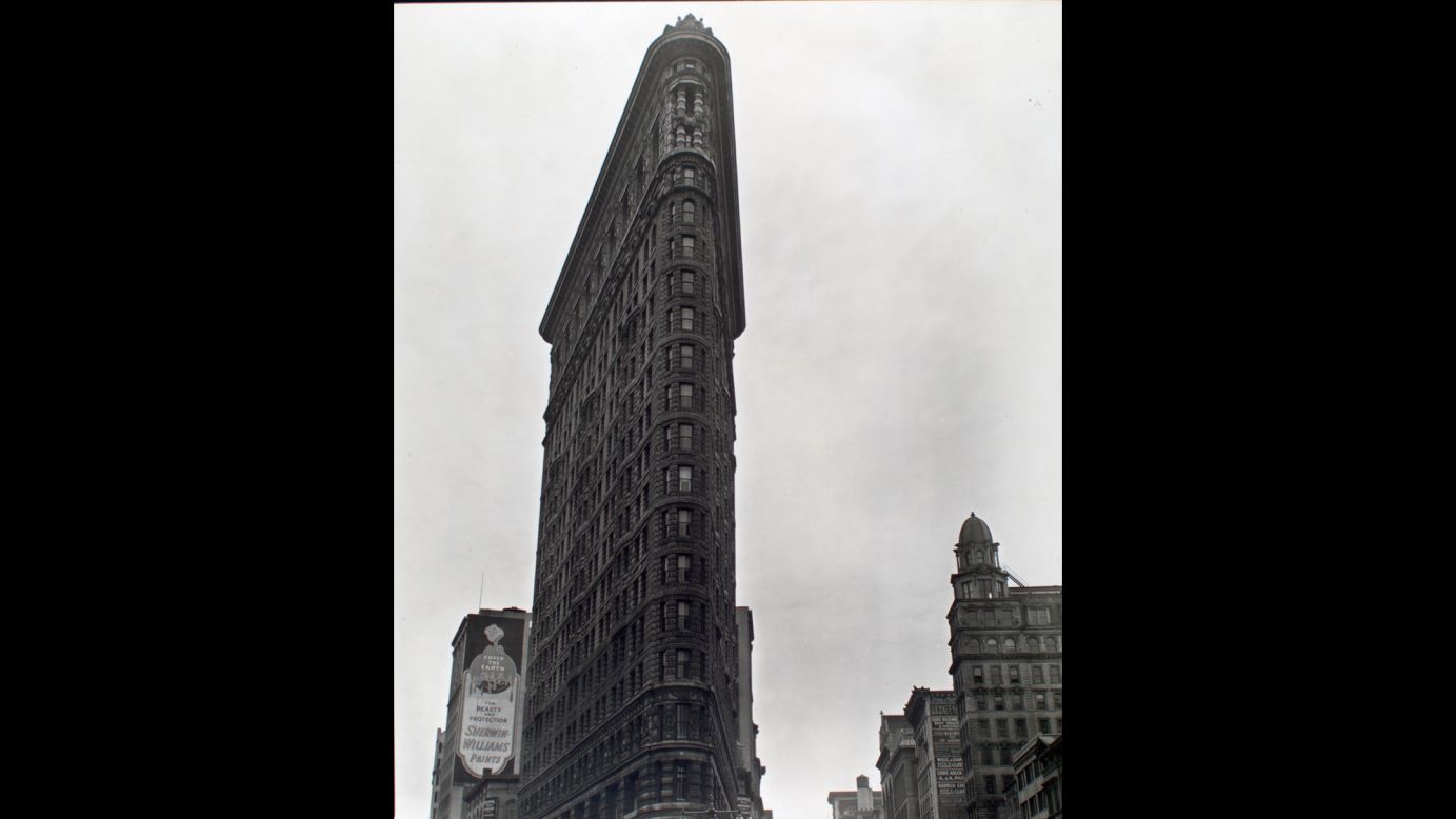 The 22-story Flatiron Building looms skyward on Fifth Avenue and 23rd Street in 1938. The building was considered groundbreaking at its completion in 1902, and it was one of the tallest buildings in the city.