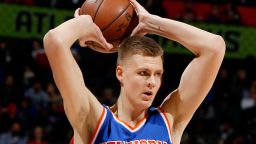 ATLANTA, GA - JANUARY 05:  Kristaps Porzingis #6 of the New York Knicks looks to pass against the Atlanta Hawks at Philips Arena on January 5, 2016 in Atlanta, Georgia.  NOTE TO USER User expressly acknowledges and agrees that, by downloading and or using this photograph, user is consenting to the terms and conditions of the Getty Images License Agreement.  (Photo by Kevin C. Cox/Getty Images)