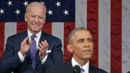 Vice President Joe Biden applauds President Barack Obama during the State of the Union address on January 20, 2015 in the House Chamber of the U.S. Capitol.