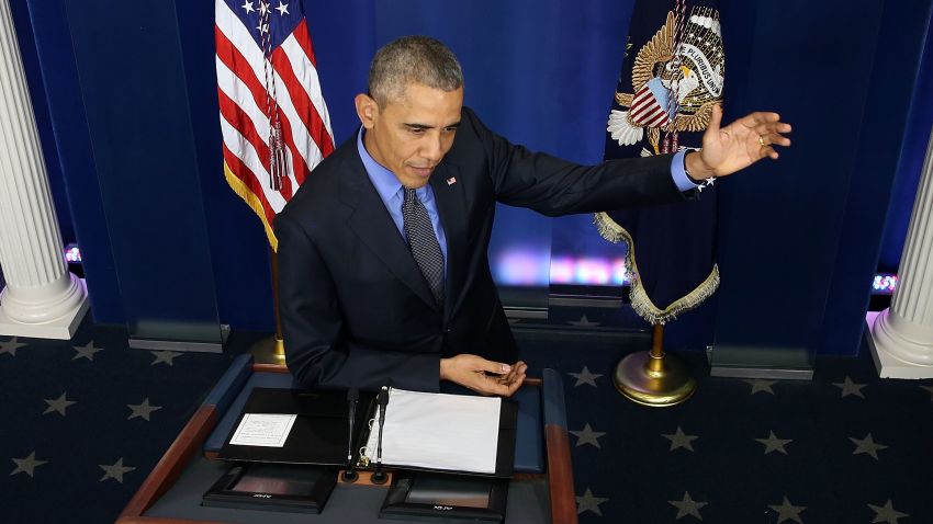 President Barack Obama speaks to the media at the White House December 18, 2015.
