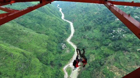 A BASE jumper descends from the Baling River Bridge in Anshun, China, in July 2012. That's when China held its first-ever BASE jumping event from the suspension bridge, which is considered one of the highest in the world.