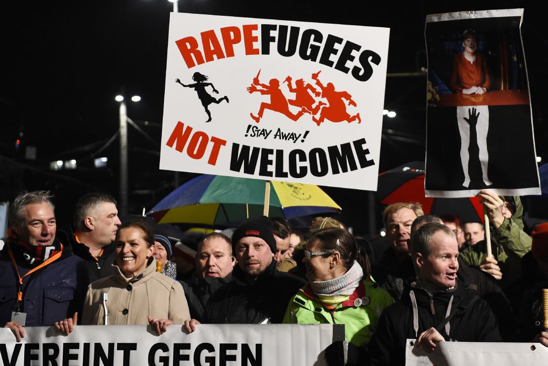 A sign read, "Rapefugees not welcome."