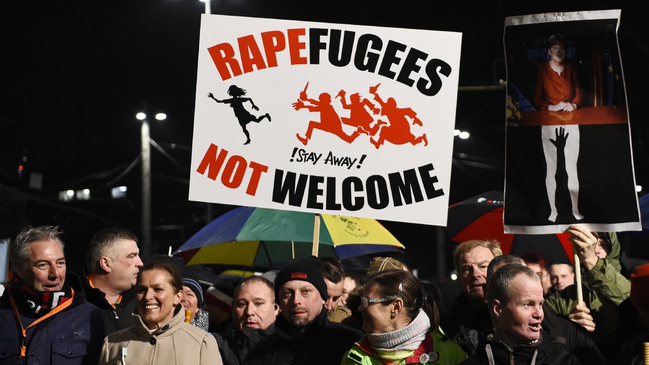 A sign read, "Rapefugees not welcome."