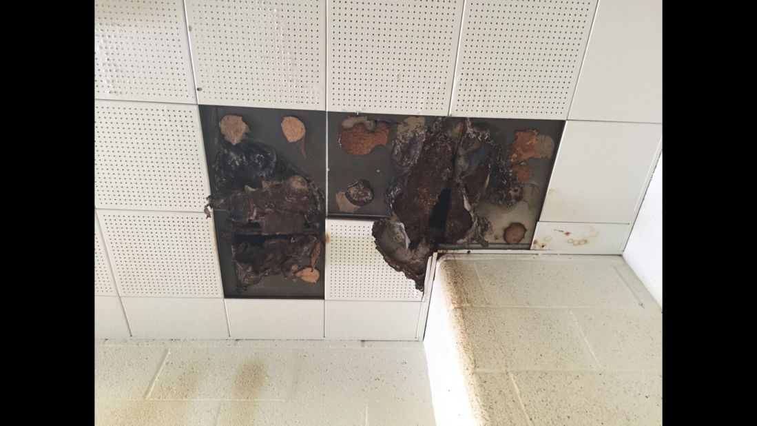 Photos taken at three Detroit schools show deterioration at school facilities. Teachers have protested the conditions by calling in sick in large groups. 