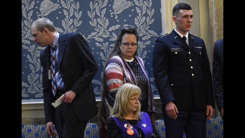 Kim Davis, center, the Rowan County, Kentucky, clerk who refused to sign marriage licenses for same-sex couples, arrives before the speech.