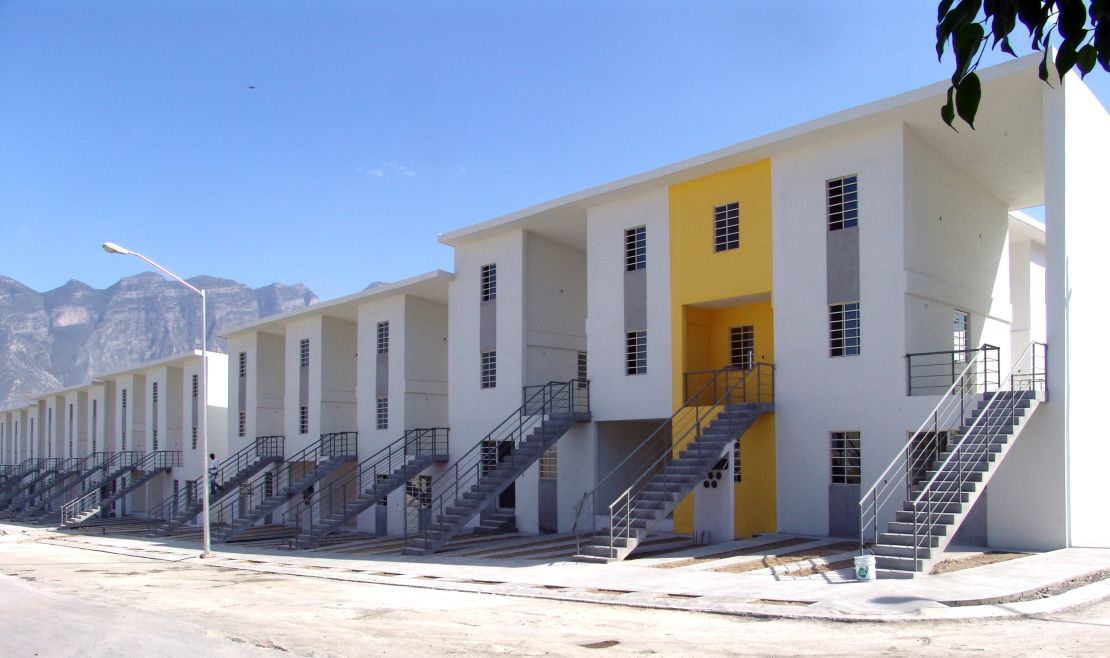 "Half of a good house" financed with public money. The yellow block, filled-in, shows how middle-class standard can be achieved by the residents themselves. 