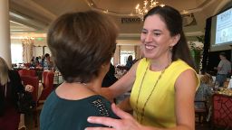 Victoria Maxwell hugs a supporter after her speech to the Collier County, Florida, chapter of the National Alliance on Mental Illness.