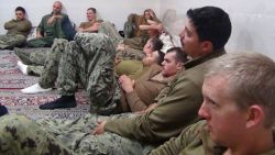 This picture released by the Iranian Revolutionary Guards on Wednesday, Jan. 13, 2016, shows detained American Navy sailors in an undisclosed location in Iran.