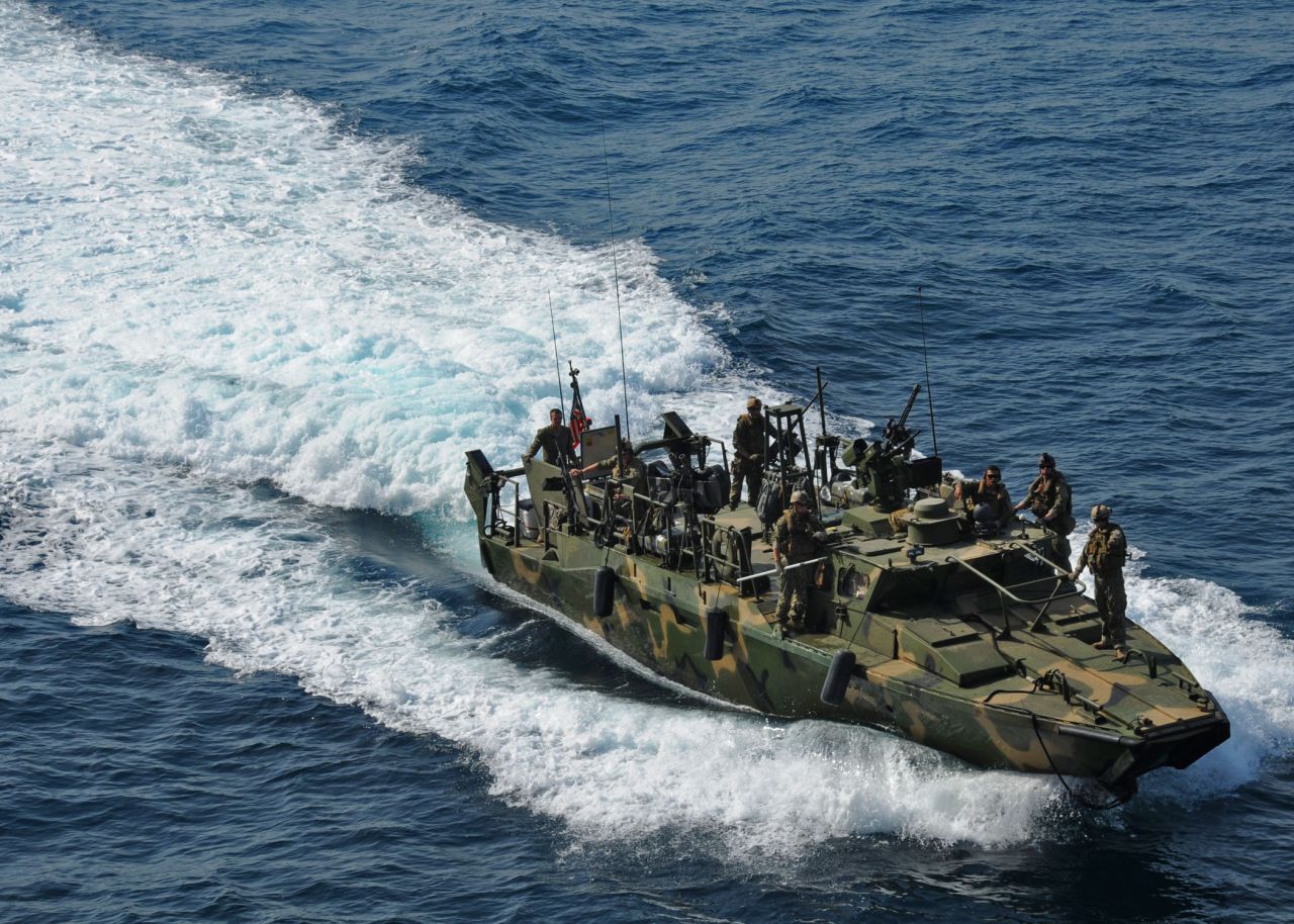 A riverine command boat takes part in a training exercise in June 2012.