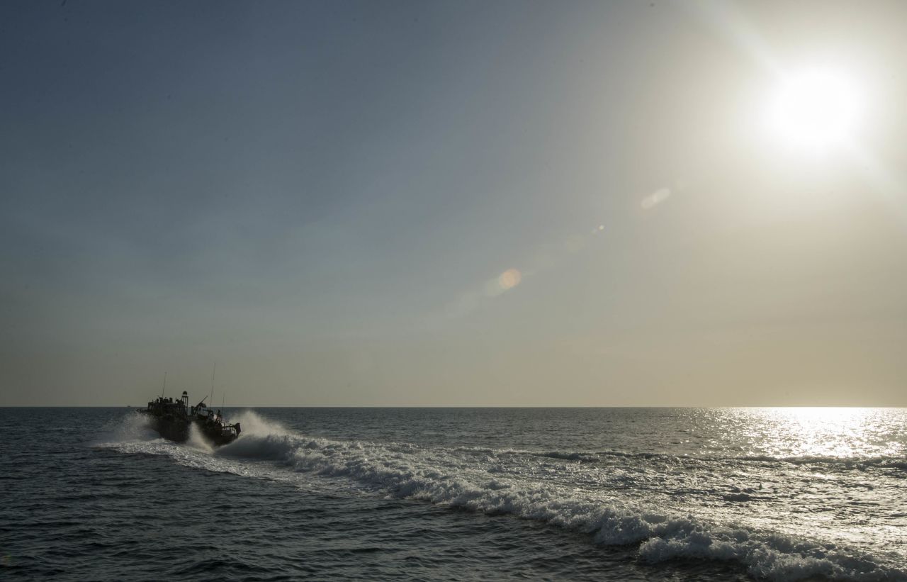 Riverine Command Boat 802 conducts patrol operations in the Gulf on October 25.