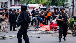 JAKARTA, INDONESIA - JANUARY 14:  Indonesian policemen stands guard near the blast site after a series of explosions hit the Indonesia capital on January 14, 2016 in Jakarta, Indonesia. Reports of explosions and gunshots in the centre of the Indonesian capital, including outside the United Nations building and in the front of the Sarinah shopping mall, an area with many luxury hotels, embassies and offices.  (Photo by Oscar Siagian/Getty Images)