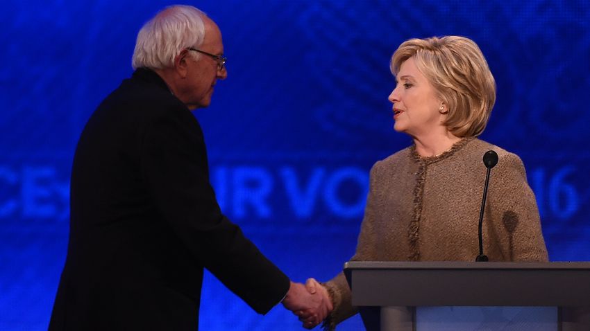 Bernie Sanders and Hillary Clinton shake hands at the end of the Democratic presidential debate hosted by ABC News at Saint Anselm College in Manchester, New Hampshire, on December 19, 2015.