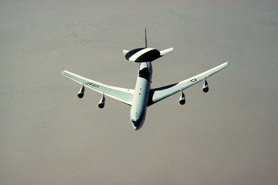 AWACS stands for airborne warning and control system. This four-engine jet, based on a Boeing 707 platform, monitors and manages battle space with its huge rotating radar dome. The planes have a flight crew of four supporting 13 to 19 specialists and controllers giving direction to units around the battle space. The Air Force has 32 E-3s in inventory.