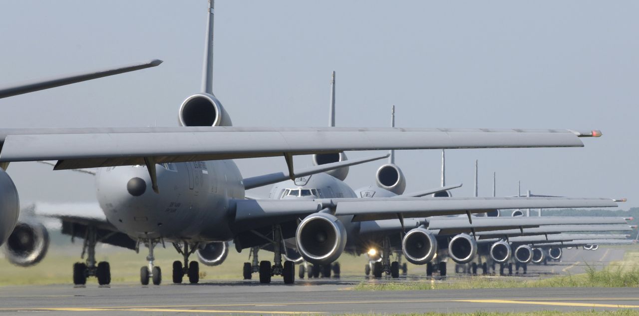 Based on the DC-10 passenger jet, the triple-engine KC-10 is a gas station in the sky with the ability to carry 75 people and 170,000 pounds of cargo. In its six tanks, the KC-10 can carry up to 356,000 pounds of fuel and dispense it while airborne. The Air Force has 59 KC-10s on active duty.