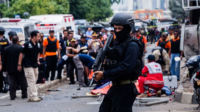 A policeman stands guard in front of a blast site in central Jakarta, capital of Indonesia, on January 14, 2016.