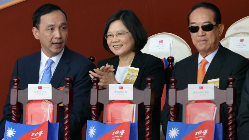(L to R) Eric Chu, chairman of Taiwan's ruling Kuomintang (KMT), Tsai Ing-wen, chairwoman of Taiwan's main opposition Democratic Progressive Party (DPP), and James Soong, chairman of the opposition People First Party (PFP) attend a National Day ceremony in front of the presidential palace in Taipei on October 10, 2015.  Taiwan's embattled President Ma Ying-jeou defended his China-friendly policy on October 10 in his last National Day speech, as thousands gathered in the capital.    AFP PHOTO / Sam Yeh        (Photo credit should read SAM YEH/AFP/Getty Images)