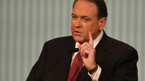 Republican Presidential candidate Mike Huckabee gestures during the under card Republican Presidential debate sponsored by Fox Business and the Republican National Committee at the North Charleston Coliseum and Performing Arts Center in Charleston, South Carolina on January 14, 2016. AFP PHOTO/ TIMOTHY A. CLARY / AFP / TIMOTHY A. CLARY (Photo credit should read TIMOTHY A. CLARY/AFP/Getty Images)