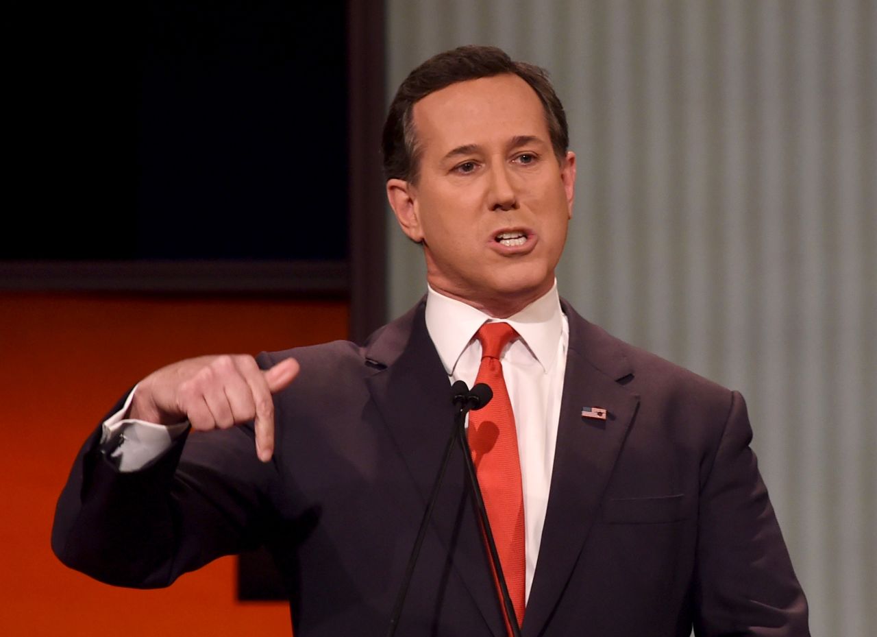 Santorum, a former U.S. senator from Pennsylvania, delivers remarks during the debate. "The biggest reason that we're seeing the hollowing out of middle America is the breakdown of the American family," he said. "We have been too politically correct in this country because we don't want to offend anybody to fight for the lives of our children."
