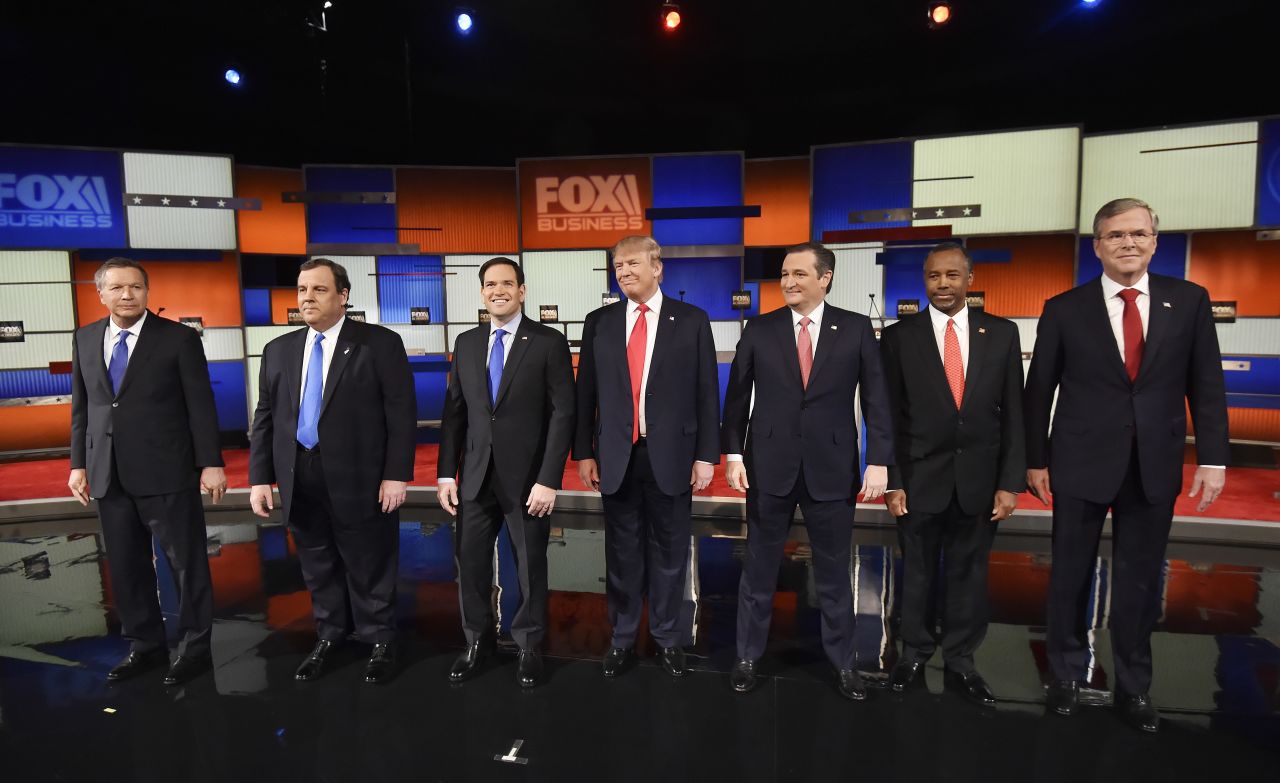 Republican presidential candidates line up on stage before a debate Thursday, January 14, in North Charleston, South Carolina. From left are Ohio Gov. John Kasich, New Jersey Gov. Chris Christie, U.S. Sen. Marco Rubio, Donald Trump, U.S. Sen. Ted Cruz, Ben Carson and Jeb Bush. It is the sixth GOP debate of this election cycle and the first of 2016.