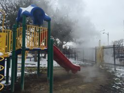 Students aren't allowed to use the playground. It's too hot because of steam wafting onto it.