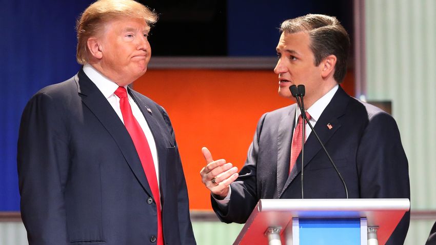 NORTH CHARLESTON, SC - JANUARY 14:  Republican presidential candidates (L-R) Donald Trump and Sen. Ted Cruz (R-TX) speak during a commercial break in the Fox Business Network Republican presidential debate at the North Charleston Coliseum and Performing Arts Center on January 14, 2016 in North Charleston, South Carolina. The sixth Republican debate is held in two parts, one main debate for the top seven candidates, and another for three other candidates lower in the current polls.  (Photo by Scott Olson/Getty Images)