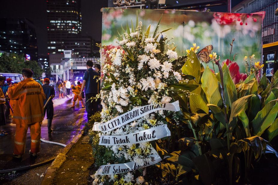 A bouquet of flowers is placed in front of an explosion site on January 14 in Jakarta.