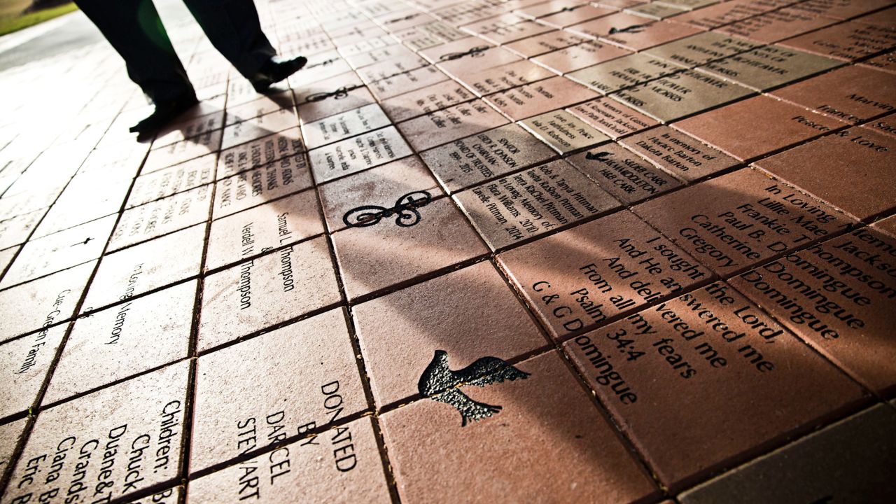 Custom bricks line the walkway of Ebenezer Baptist Church, which stands across from the King Center in Atlanta. As generations leave the inner city and the church loses membership, members are trying to bring in donations through the bricks.