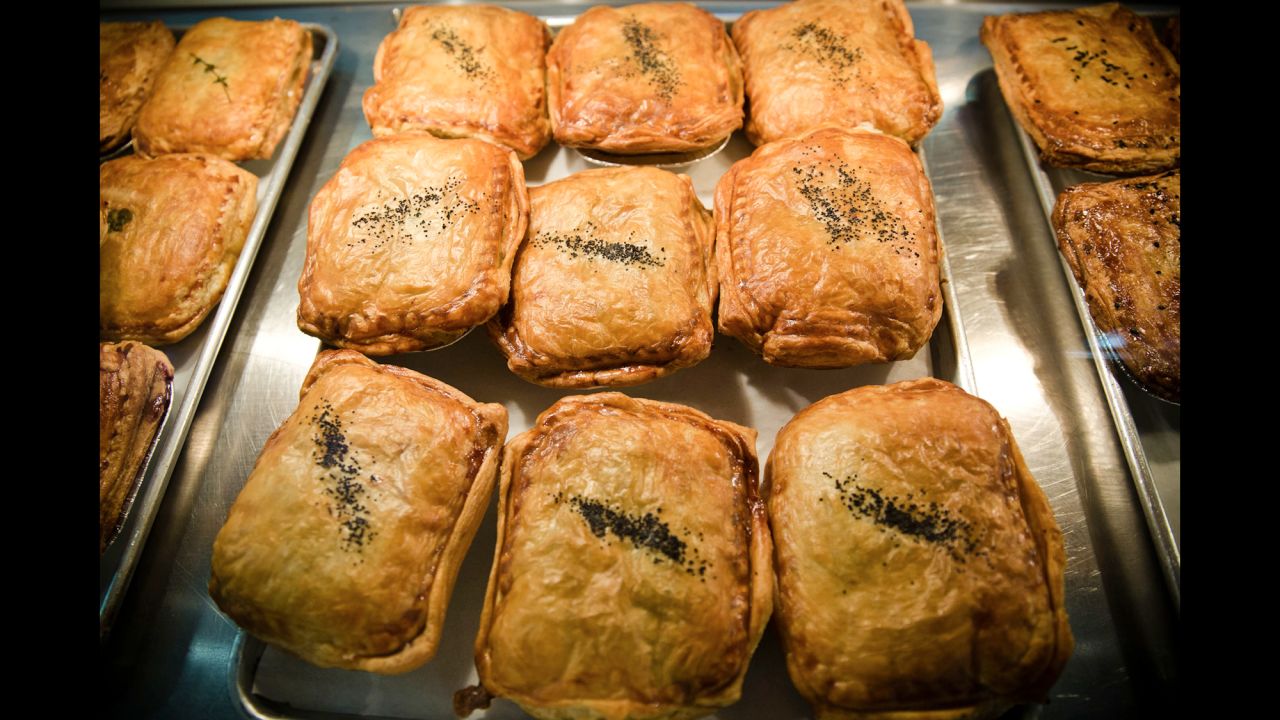 The streetcar stops at Sweet Auburn Curb Market, the city's oldest municipal market, where locals shop from butchers, green grocers and fishmongers. Food stalls offer new and old culinary traditions, from soul food, hamburgers and burritos to arepas, crepes and South African-inspired savory pies, pictured here, from Panbury's Double Crust Pies.