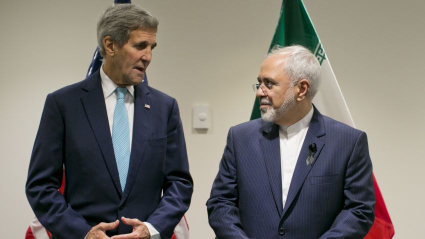 United States Secretary of State John Kerry poses with Foreign Affairs Minister of Iran Javad Zarif during a bilateral talk at the United Nations headquarters on September 26, 2015, at the United Nations in New York.