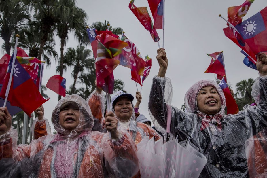 Supporters cheer while Chu parades through the streets during a rally on January 15.