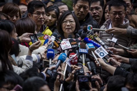 Tsai Ing-wen talks to journalists after casting her ballot at a polling station. She will have her work cut out balancing the interests of China, which is the island's biggest trading partner, the United States, its key ally, and the diverse demands of the island's 23 million residents.<br />