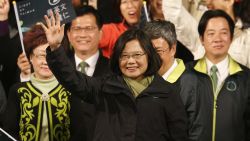 Taiwan's Democratic Progressive Party, DPP, presidential candidate, Tsai Ing-wen, raises her hands as she declares victory in the presidential election Saturday, Jan. 16, 2016, in Taipei, Taiwan. (AP Photo/Wally Santana)