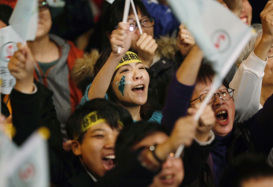 Supporters of Tsai Ing-wen cheer at the campaign headquarters as early polling numbers arrive in her favor. Tsai, a soft-spoken U.S.-educated lawyer, is viewed as a pragmatic leader.